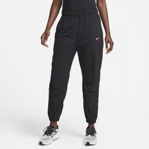 Pantaloni da running da riscaldamento a 7/8 a vita media Nike Dri-FIT Fast ? Donna - Nero